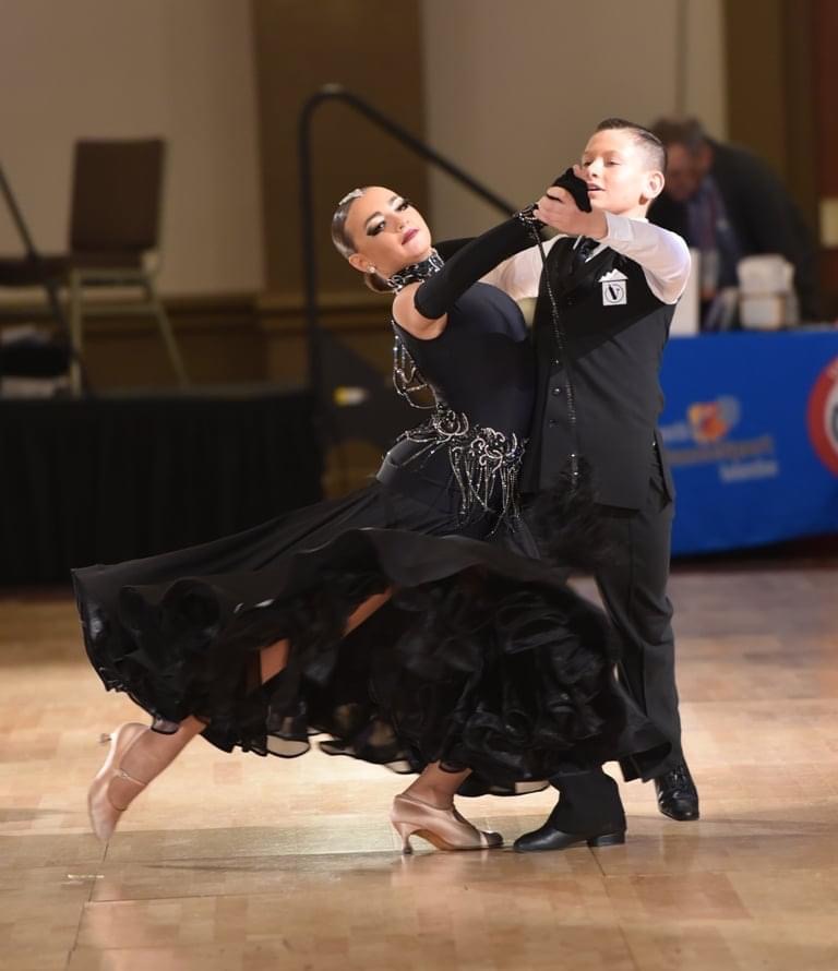 Sebastian Gluzman and Katerina Penatzer demonstrate style and sophistication. They won Junior II Pre-Champ Standard. Photo by Lee Penatzer.