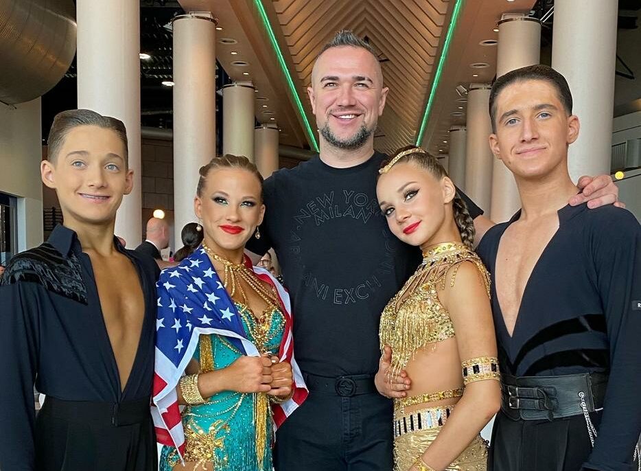 Team USA poses with their proud coach, Vladimir Karpov, after completing their rounds! Congratulations to All!! (left to right) Jordan, Finley, Vladimir, Elita, and Henry.