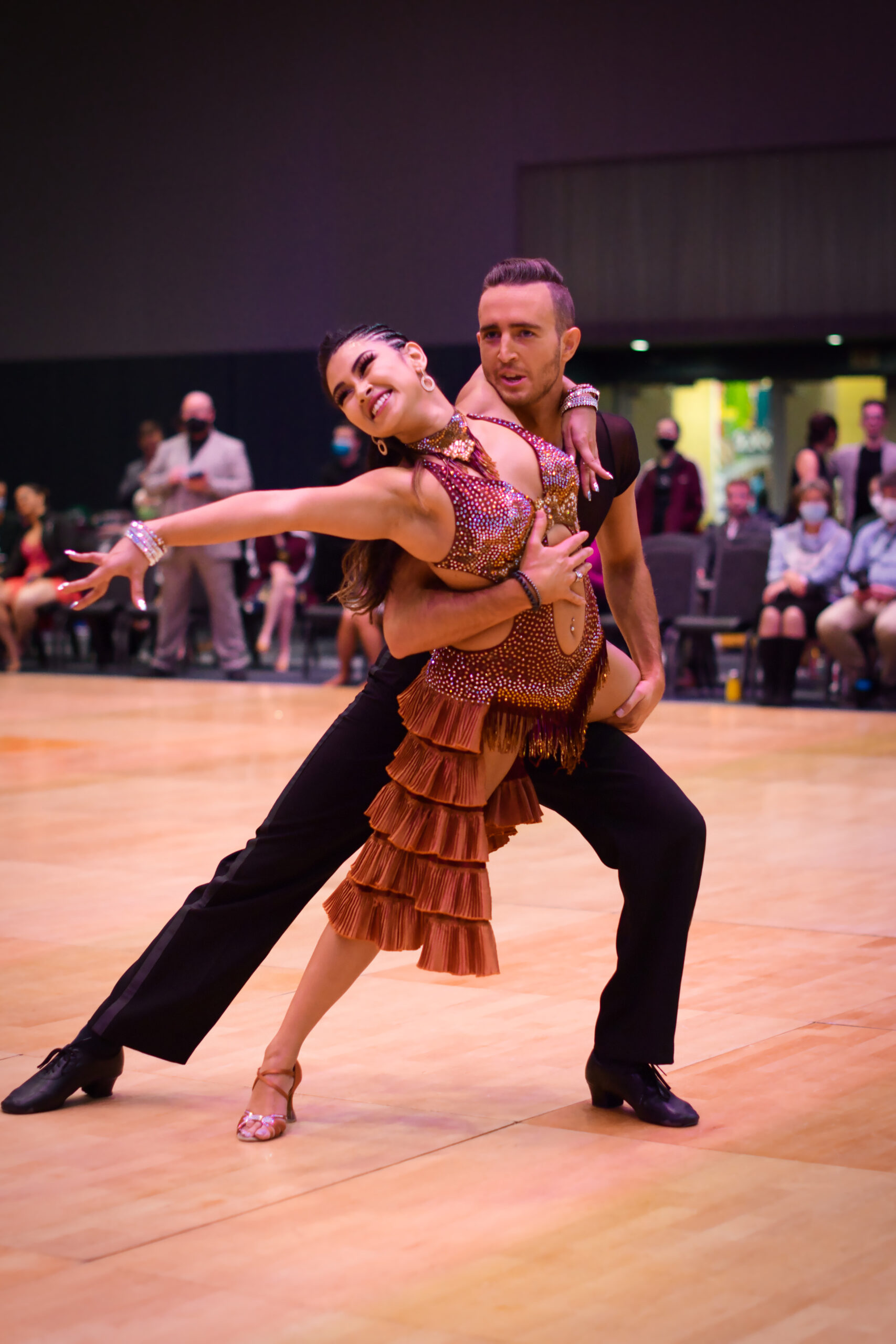 Stephen Sekoulopoulos and Sabrina Sharmeen are the 2022 Amateur Adult Rhythm Champions and Amateur Adult Latin Bronze Medalists. Photo by Guy Platt.