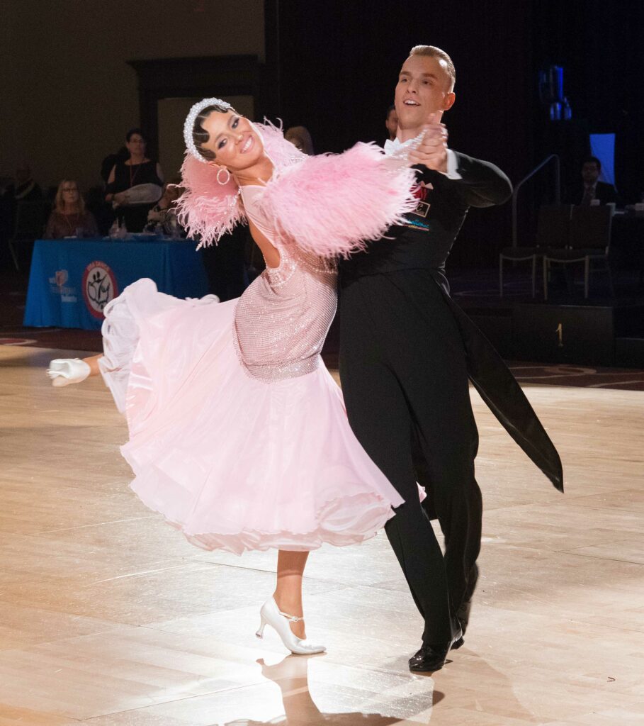 The 2022 Adult Standard National Champions, Alexandru Munteanu and Anya Sheedy, always dazzle the crowd with their beauty and strong performance. The couple represents the United States around the world. Photo by Carson Zullinger