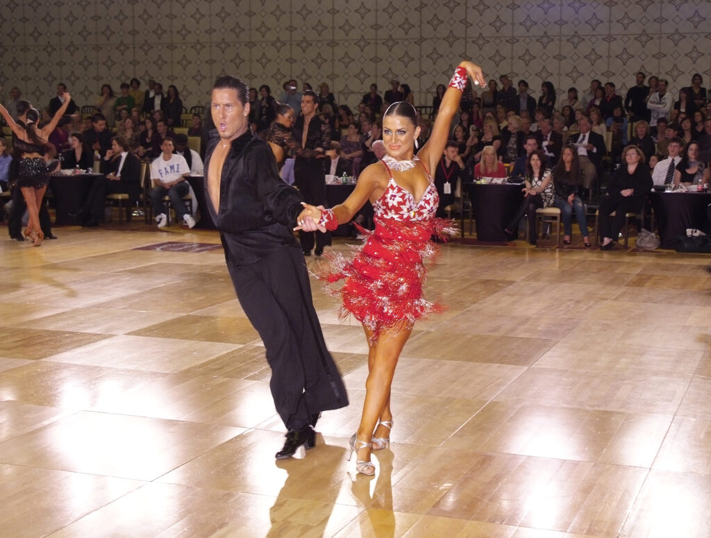 Adult Amateur Val Chmerkovskiy with his partner Daria Chesnokova won three United States International Latin titles. Here they are dancing in the 2010 USA Dance Nationals. Photo by Carson Zullinger.